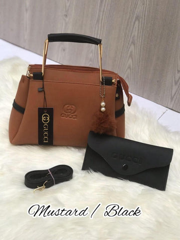 Most Demandable Gucci 2 Piece set. Featuring a long wallet and cute pom pom keychains