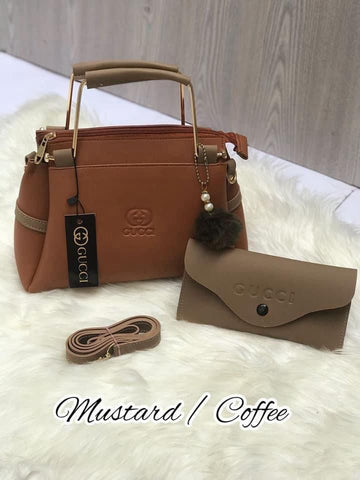 Most Demandable Gucci 2 Piece set. Featuring a long wallet and cute pom pom keychains