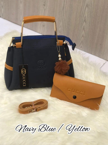 Most Demandable Gucci 2 Piece set. Featuring a long wallet and cute pom pom keychains