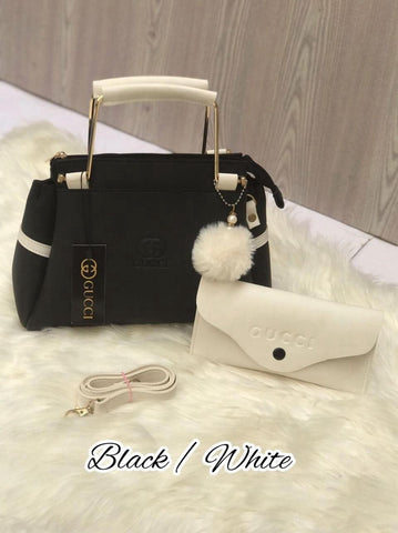 Most Demandable Gucci 2 Piece set. Featuring a long wallet and cute pom pom keychains