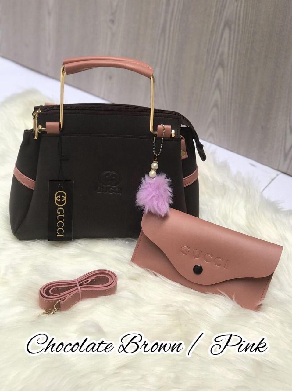 Most Demandable Gucci 2 Piece set. Featuring a long wallet and cute pom pom keychains