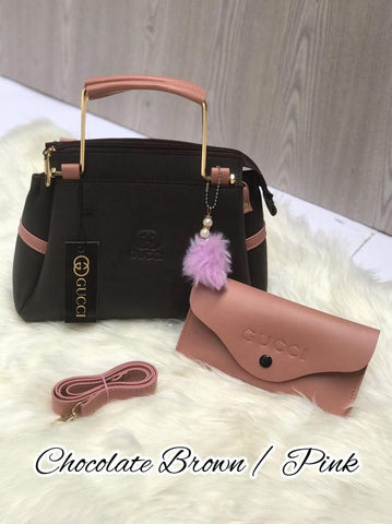 Most Demandable Gucci 2 Piece set. Featuring a long wallet and cute pom pom keychains