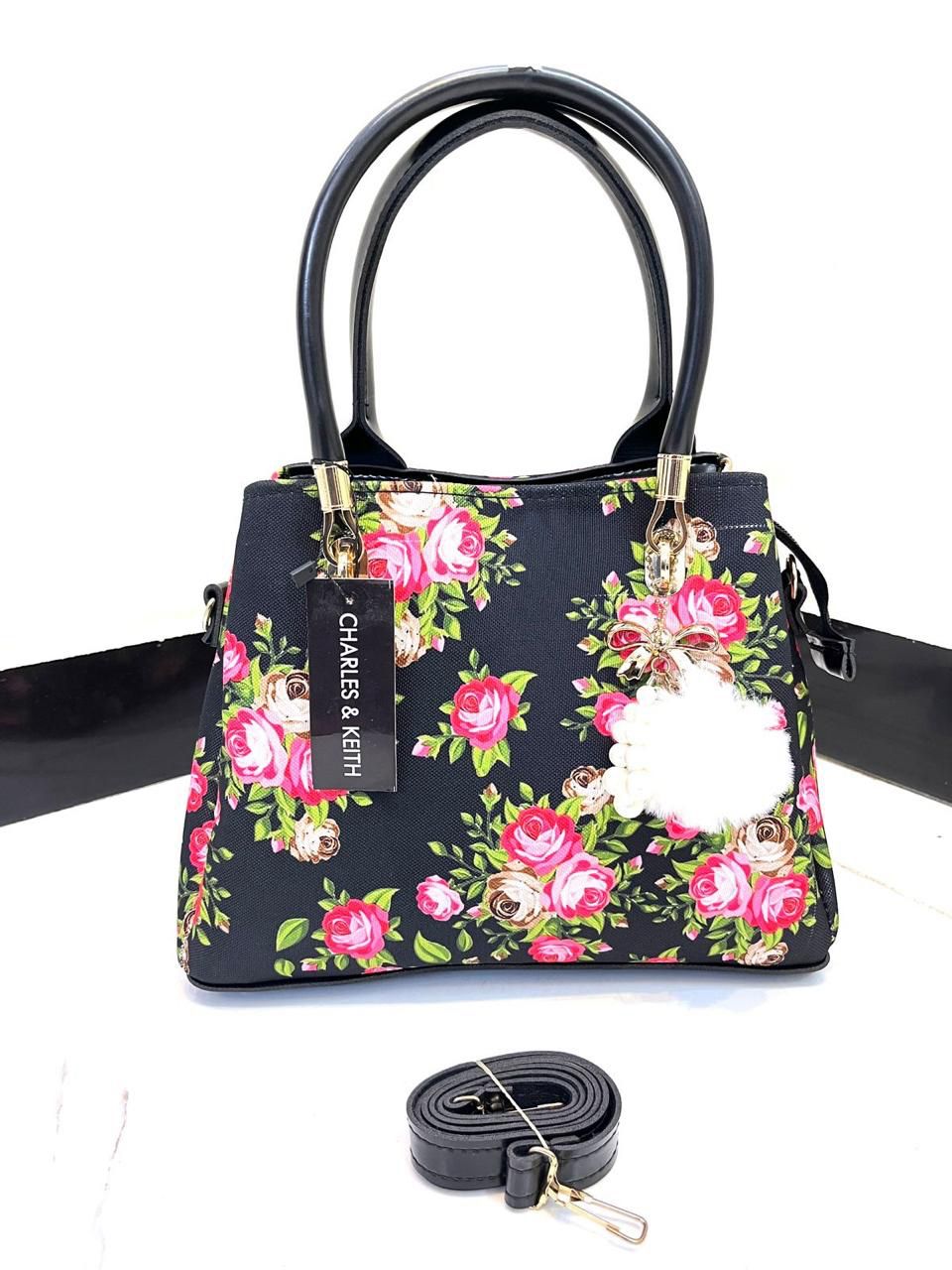 High Quality Floral Bag. Designed with a long belt and 3 portion style
